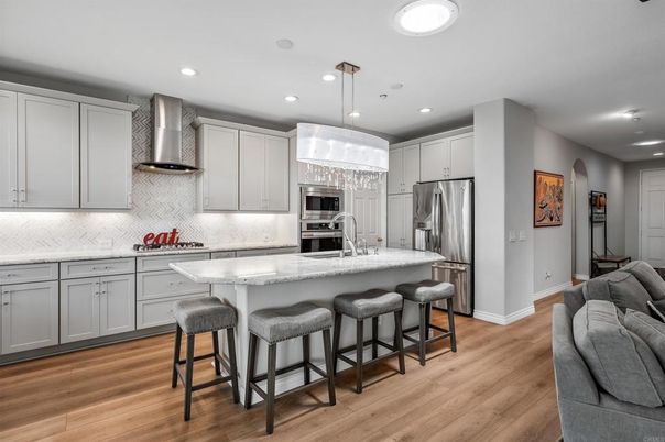 Chandelier, Interior, Kitchen, Recessed Lighting, Stainless Steel Appliances, Wood Texture Flooring