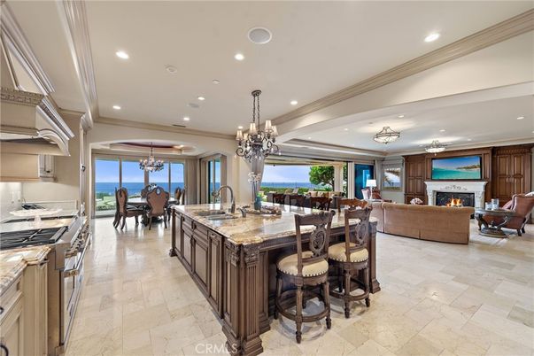 Chandelier, Dining room, Fireplace, Interior, Kitchen, Living room, Recessed Lighting, Water