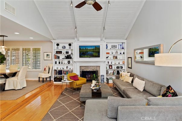 Dining room, Fireplace, Interior, Living room, Pendant Lights, Recessed Lighting, Wood Texture Flooring