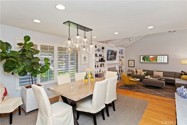 Dining room, Fireplace, Interior, Living room, Pendant Lights, Recessed Lighting, Wood Texture Flooring