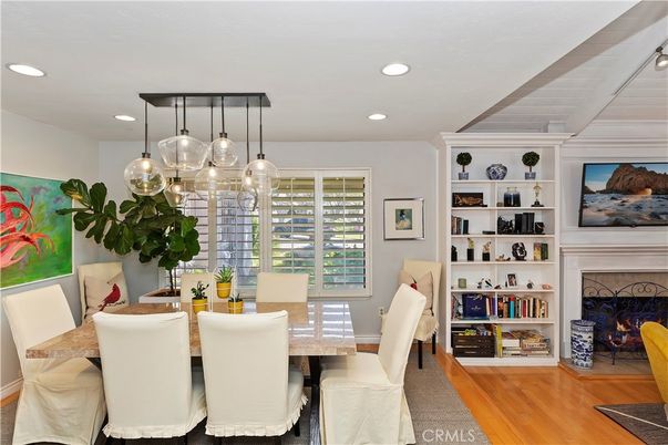 Dining room, Fireplace, Interior, Pendant Lights, Recessed Lighting, Wood Texture Flooring