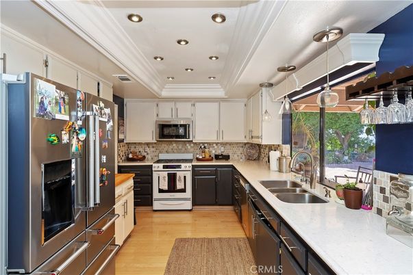 Interior, Kitchen, Pendant Lights, Recessed Lighting, Stainless Steel Appliances, Wood Texture Flooring