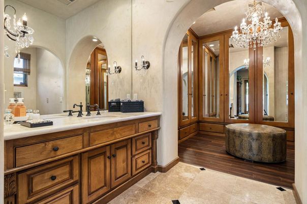 Bathroom, Chandelier, Dual Sink Vanities, Interior, Wood Texture Flooring