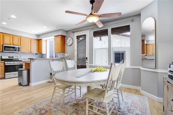 Dining room, Interior, Kitchen, Recessed Lighting, Stainless Steel Appliances, Wood Texture Flooring