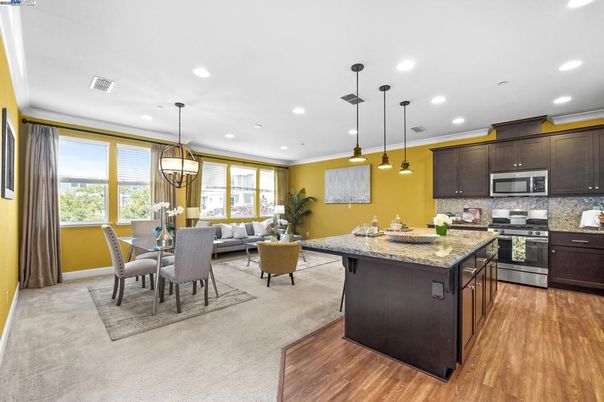 Dining room, Interior, Kitchen, Living room, Pendant Lights, Recessed Lighting, Stainless Steel Appliances, Wood Texture Flooring