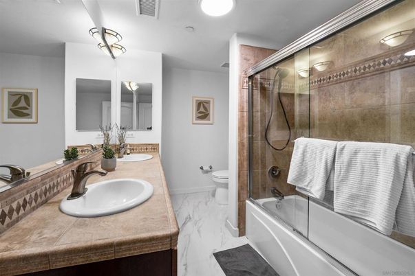 Bathroom, Dual Sink Vanities, Glass Shower, Interior, Marble, Recessed Lighting