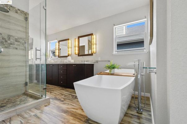 Bathroom, Dual Sink Vanities, Free Standing Baths, Glass Shower, Interior, Wood Texture Flooring