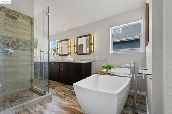 Bathroom, Dual Sink Vanities, Free Standing Baths, Glass Shower, Interior, Wood Texture Flooring