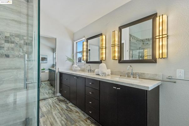 Bathroom, Dual Sink Vanities, Glass Shower, Interior, Wood Texture Flooring