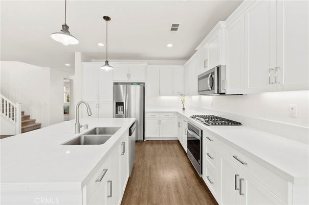 Interior, Kitchen, Pendant Lights, Recessed Lighting, Stainless Steel Appliances, Wood Texture Flooring