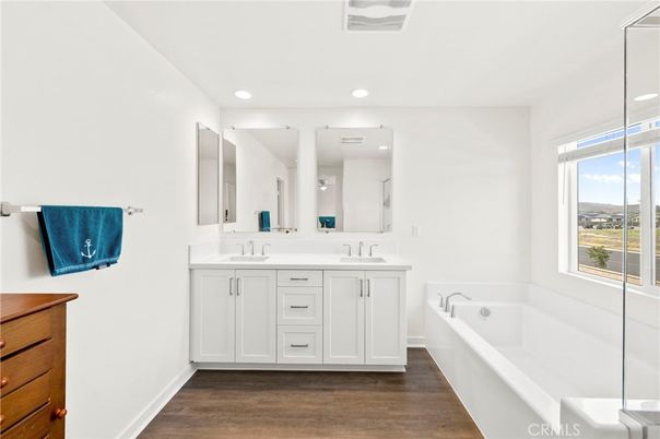 Bathroom, Dual Sink Vanities, Interior, Recessed Lighting, Wood Texture Flooring