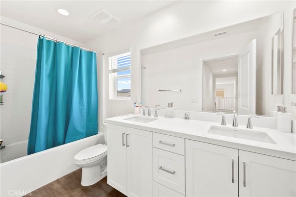 Bathroom, Dual Sink Vanities, Interior, Recessed Lighting, Wood Texture Flooring