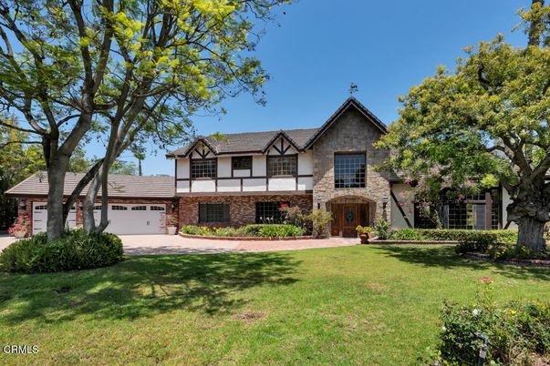 Attached, Backyard, Exterior, Facade, Brick Facade, Tudor Revival