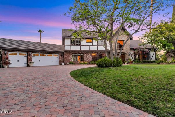 Attached, Backyard, Exterior, Facade, Brick Facade, Tudor Revival