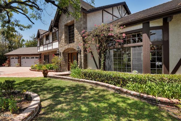 Attached, Backyard, Exterior, Facade, Brick Facade, Tudor Revival
