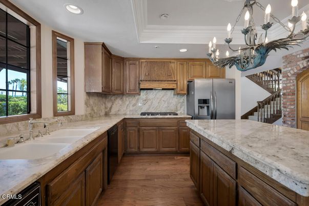 Chandelier, Interior, Kitchen, Recessed Lighting, Stainless Steel Appliances, Wood Texture Flooring