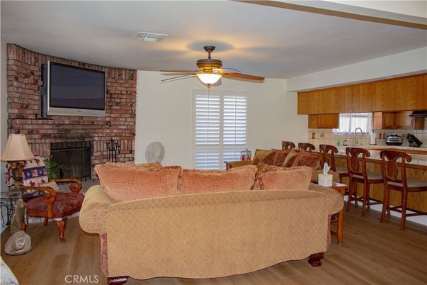 Dining room, Fireplace, Interior, Kitchen, Living room, Stone Walls, Wood Texture Flooring