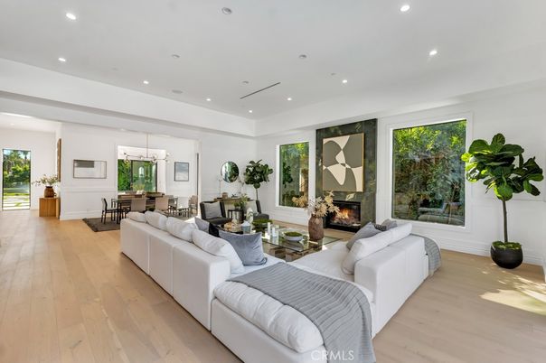Dining room, Fireplace, Interior, Living room, Pendant Lights, Recessed Lighting, Wood Texture Flooring