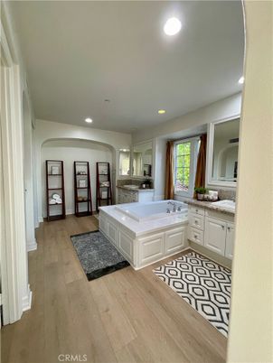 Bathroom, Dual Sink Vanities, Interior, Recessed Lighting, Wood Texture Flooring