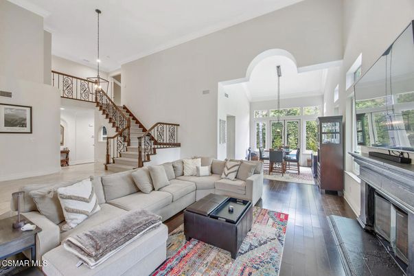 Dining room, Fireplace, Interior, Living room, Pendant Lights, Recessed Lighting, Wood Texture Flooring
