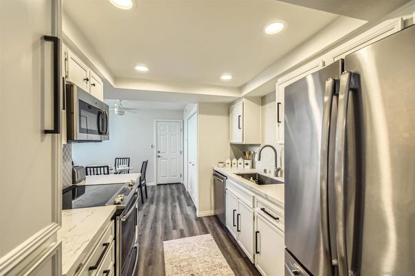 Interior, Kitchen, Recessed Lighting, Stainless Steel Appliances, Wood Texture Flooring
