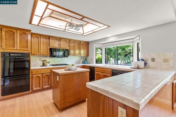 Interior, Kitchen, Tile Countertops, Wood Texture Flooring