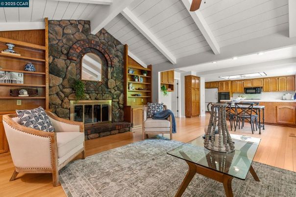 Dining room, Fireplace, Interior, Kitchen, Living room, Recessed Lighting, Stone Walls, Wood Texture Flooring