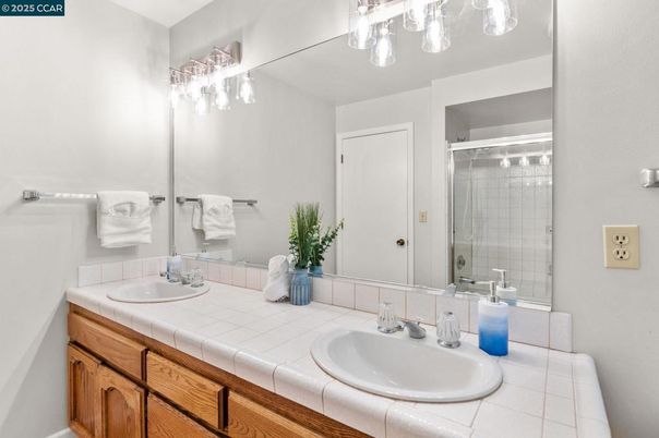 Bathroom, Dual Sink Vanities, Glass Shower, Interior, Tile Countertops