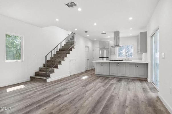 Interior, Kitchen, Recessed Lighting, Stainless Steel Appliances, Wood Texture Flooring
