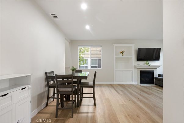 Dining room, Fireplace, Interior, Recessed Lighting, Wood Texture Flooring
