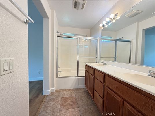 Bathroom, Dual Sink Vanities, Glass Shower, Interior, Wood Texture Flooring