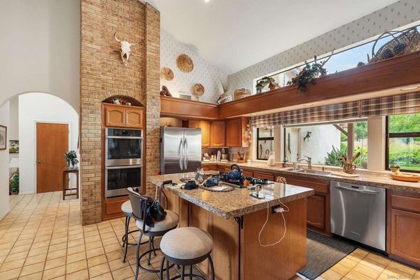 Interior, Kitchen, Recessed Lighting, Stainless Steel Appliances, Stone Walls