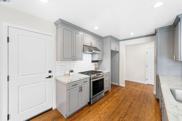 Interior, Kitchen, Recessed Lighting, Stainless Steel Appliances, Wood Texture Flooring