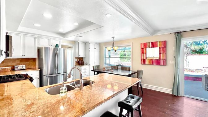 Dining room, Interior, Kitchen, Pendant Lights, Recessed Lighting, Stainless Steel Appliances, Wood Texture Flooring