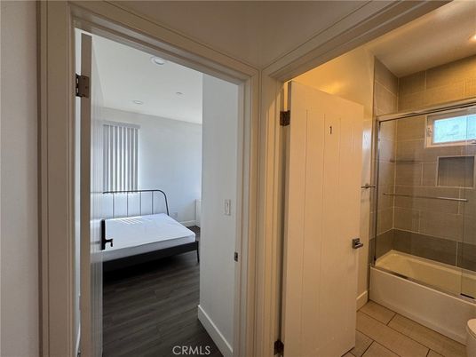 Bathroom, Glass Shower, Interior, Recessed Lighting, Wood Texture Flooring
