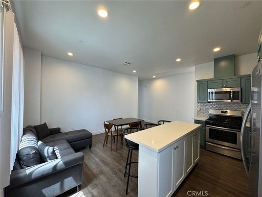 Dining room, Interior, Kitchen, Recessed Lighting, Stainless Steel Appliances, Wood Texture Flooring