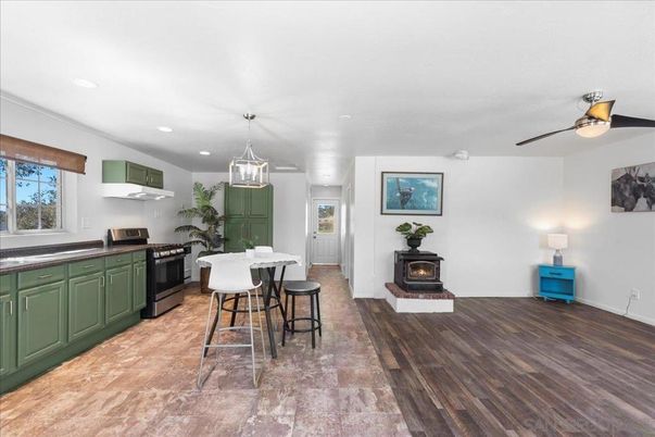 Fireplace, Interior, Kitchen, Pendant Lights, Recessed Lighting, Wood Texture Flooring