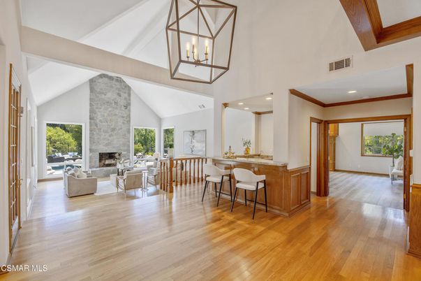 Dining room, Fireplace, Interior, Living room, Pendant Lights, Recessed Lighting, Stone Walls, Wooden Beams, Wood Texture Flooring