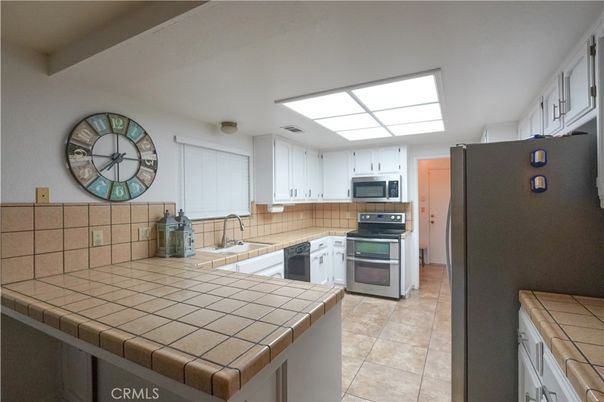 Interior, Kitchen, Stainless Steel Appliances, Tile Countertops
