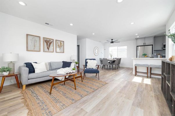 Dining room, Interior, Kitchen, Living room, Recessed Lighting, Stainless Steel Appliances, Wood Texture Flooring