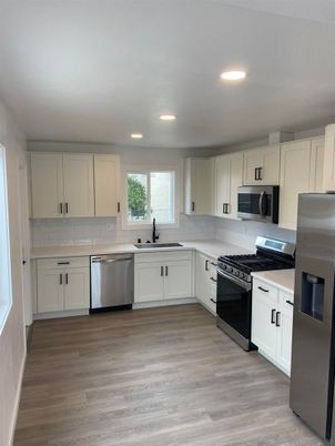 Interior, Kitchen, Recessed Lighting, Stainless Steel Appliances, Wood Texture Flooring