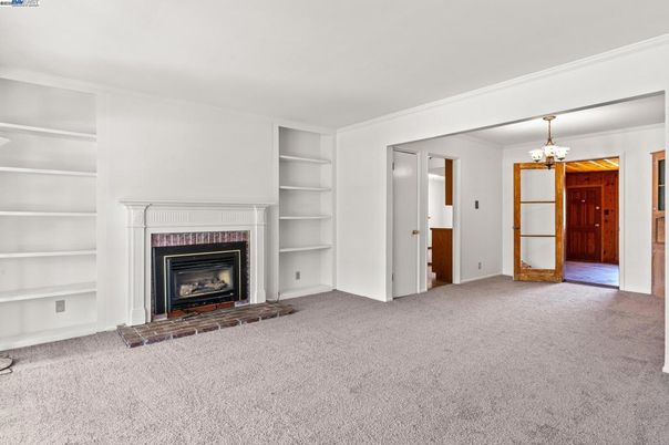 Chandelier, Empty room, Fireplace, Interior