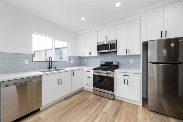 Interior, Kitchen, Recessed Lighting, Stainless Steel Appliances, Wood Texture Flooring
