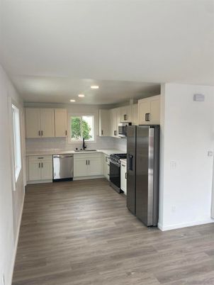 Interior, Kitchen, Recessed Lighting, Stainless Steel Appliances, Wood Texture Flooring