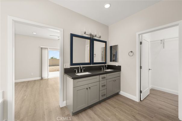 Bathroom, Dual Sink Vanities, Interior, Recessed Lighting, Wood Texture Flooring