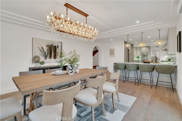 Chandelier, Dining room, Interior, Kitchen, Pendant Lights, Recessed Lighting, Stainless Steel Appliances, Wood Texture Flooring