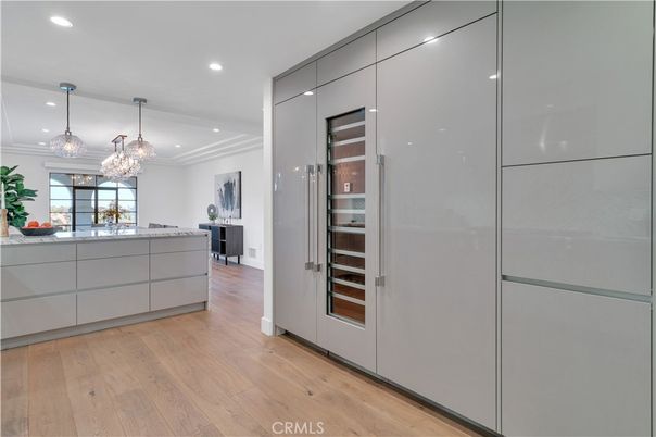 Chandelier, Interior, Kitchen, Pendant Lights, Recessed Lighting, Stainless Steel Appliances, Wood Texture Flooring