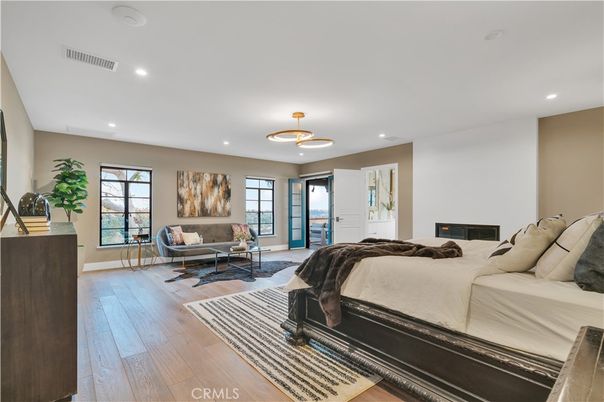 Bedroom, Fireplace, Interior, Pendant Lights, Recessed Lighting, Wood Texture Flooring