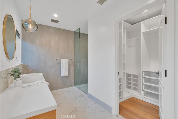 Bathroom, Glass Shower, Interior, Marble, Pendant Lights, Recessed Lighting, Wood Texture Flooring