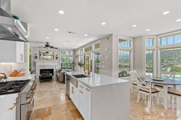 Dining room, Fireplace, Interior, Kitchen, Living room, Recessed Lighting, Stainless Steel Appliances